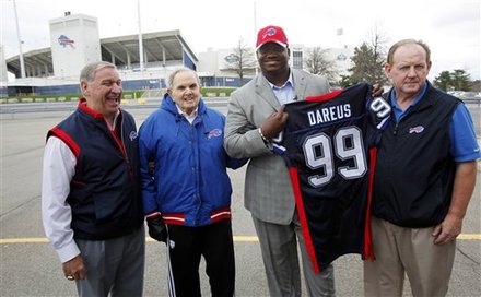 C.J. Spiller and Ralph Wilson